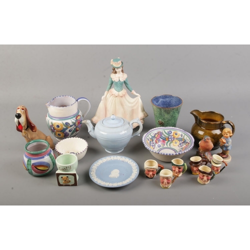 82 - A collection of ceramics. Includes Wade, Poole, Royal Worcester, Coalport, Keele Street Sooty egg cu... 