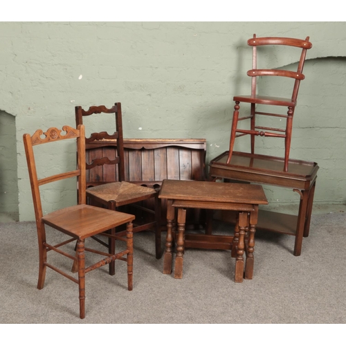 521 - A large quantity of furniture including a wall hanging plate rack, three individual chairs, occasion... 