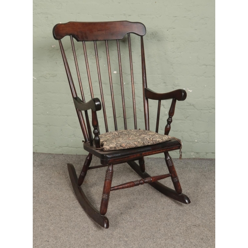 523 - A vintage rocking chair