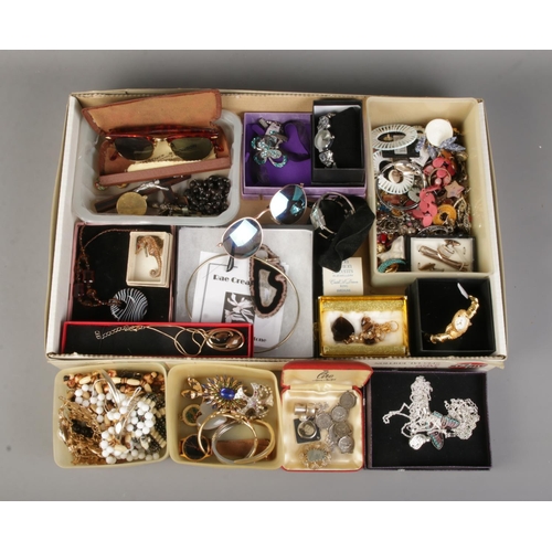 86 - A tray of mainly costume jewellery. Includes Radley watch, Moda sunglasses, necklaces, earrings etc.