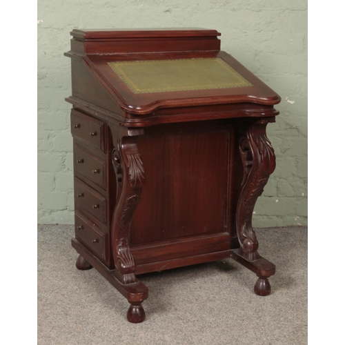 533 - A mahogany davenport with leather inset top and drawers to each side. Height: 86cm.