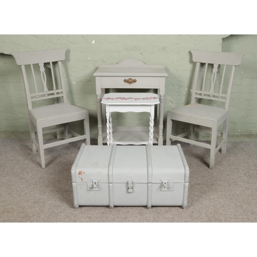 540 - A collection of grey painted furniture, to include two chairs, occasional table and travel chest.