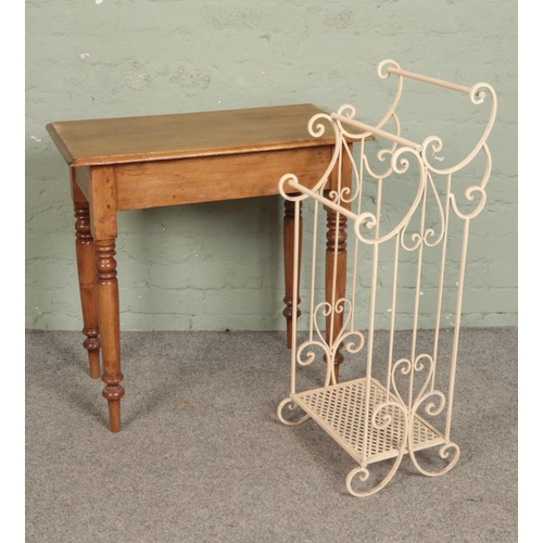 544 - A small pine side table together with an iron French style towel rail.