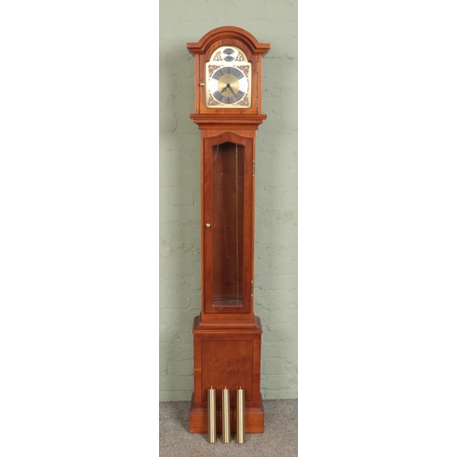 548 - A walnut cased Tempus Fugit triple-weight granddaughter clock, with Roman Numeral dial and Chime/Sil... 