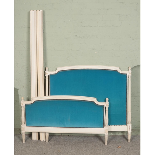 563 - A French small double bed with painted body and blue velvet upholstered back and foot board.

Lx203c... 