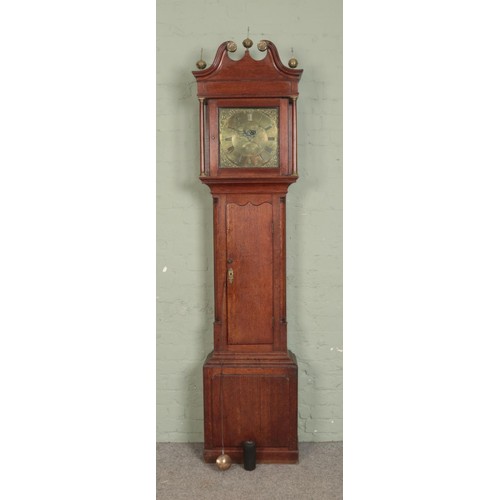 564 - A George III oak cased 30 hour longcase clock, Thomas Lister of Halifax with weight and pendulum.