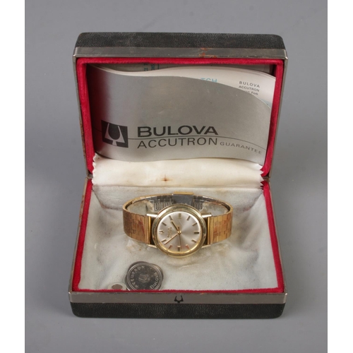 404 - A gents stainless steel Bulova Accutron quartz wristwatch on gold plated strap. With box and papers.