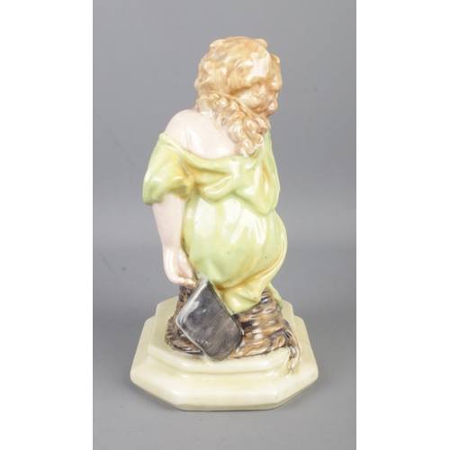 1 - An early Royal Doulton figurine; 'Sleepy Scholar', by W. White, HN16. Issued between 1913-38. Modell... 