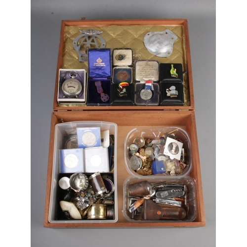 105 - A case of mixed collectables including coinage, metal trinket boxes, various pin badges and medals, ... 