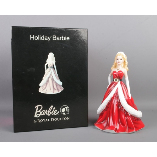 106 - Barbie by Royal Doulton; A Limited Edition figurine 2922/3500 titled 'Holiday Barbie' HN 5531. With ... 