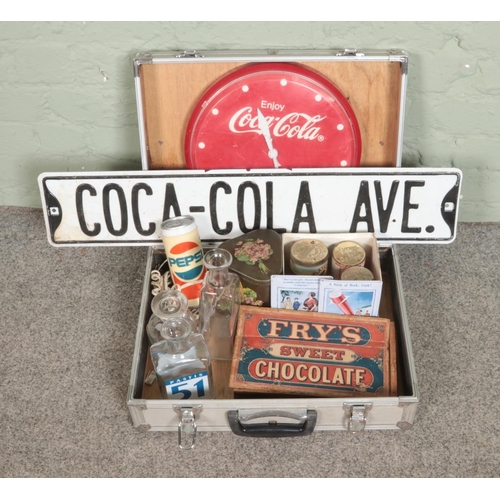 109 - A collection of advertising collectables including Coca Cola sign, Fry's Chocolate box, bottles, Pep... 