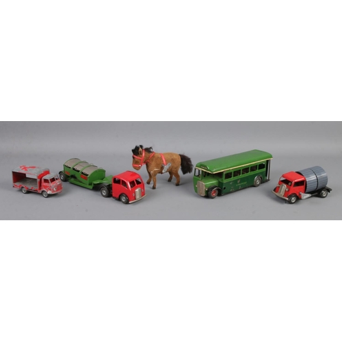 116 - A collection of vintage toys, to include several Tri-Ang Mimic vehicles, Mettoy CWS soft drinks van ... 