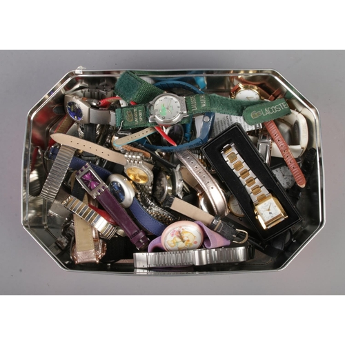 123 - A mixed tin of wristwatches including Superdry and Lacoste examples