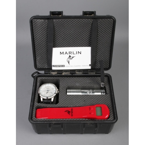 126 - A Marlin quartz wristwatch, 50m WR, with booklet, scales and torch, in hard case.