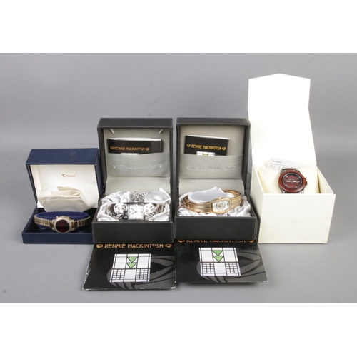 128 - Four boxed quartz wristwatches, including two Rennie Mackintosh examples.