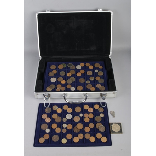 138 - An aluminium coin collectors case containing four trays of mostly pre-decimal British coins to inclu... 