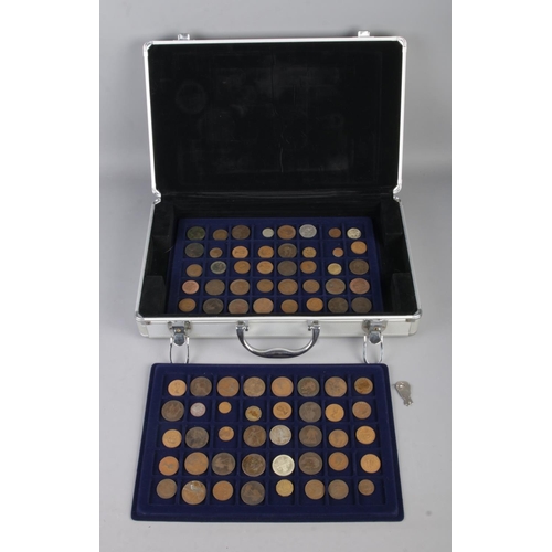 138 - An aluminium coin collectors case containing four trays of mostly pre-decimal British coins to inclu... 