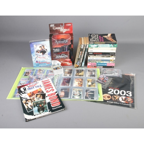 158 - A collection of 007 James Bond books and collectables to include 2002 007 Spy Files trading cards, B... 