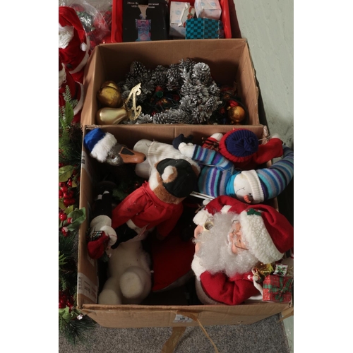 181 - Three boxes of assorted Christmas decorations to include ceramics, battery operated Santa Claus, art... 