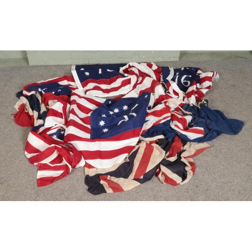 183 - A large quantity of quality panel stitch flags English and American examples