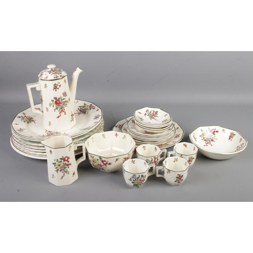 187 - A Royal Doulton tea service. 'Old Leeds Sprays' including tea pot, milk jug, sugar bowl and plates, ... 