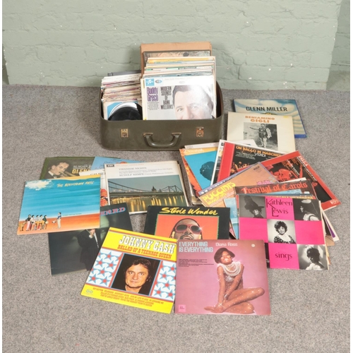 196 - A large collection of records and singles including Dianna Ross, The Boomtown Rats, Johnny Cash, Cli... 