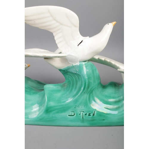 31 - B. Rezl (1899-1963) ceramic figure groups of three birds in flight over waves. Numbered 2431 to reve... 