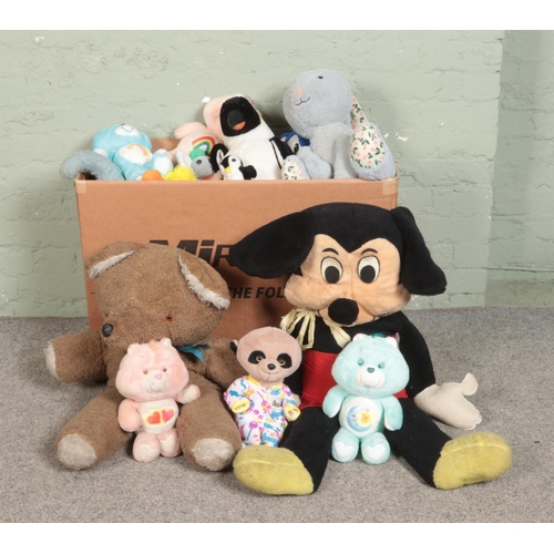 240 - An extremeley large collection of vintage soft toys, to include Walt Disney Mickey Mouse, meerkat, p... 