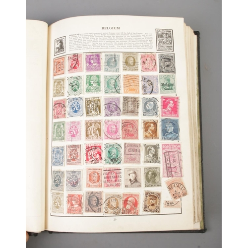 37 - A folder containing the Royal Mail Millennium stamps (2000), together with a Wayfarer stamp album co... 