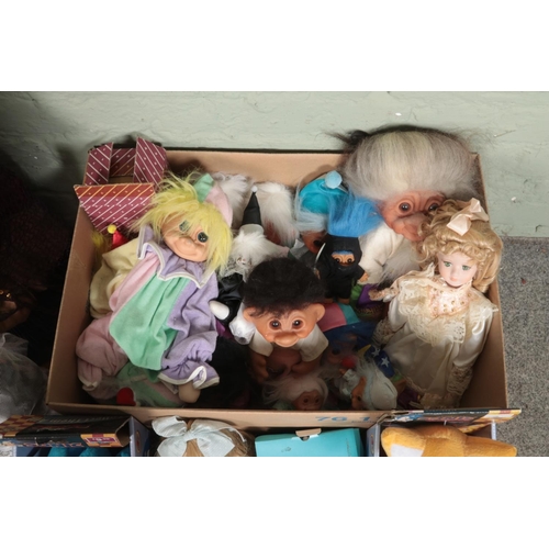 269 - A box of assorted dolls, mainly trolls. To also include boxed Sonic the Hedgehog and Tails, porcelai... 