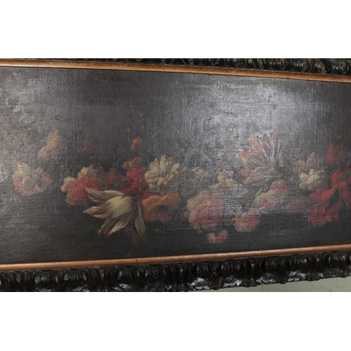 296 - After De Heem oil on canvas depicting display of hanging flowers in black painted carved frame. Appr... 