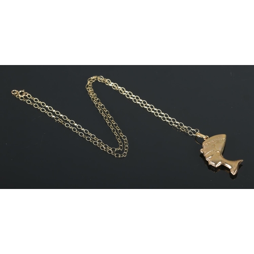 387 - A 9ct Gold pendant formed as Queen Nefertiti, suspended on 9ct necklace chain. Length of chain (doub... 