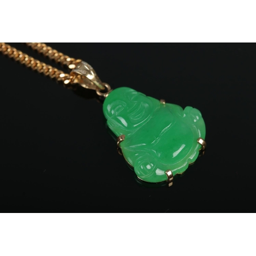 394 - A gold plated nephrite pendant formed as a Buddha, on 9ct Gold necklace chain. Weight of chain: 3.9g... 