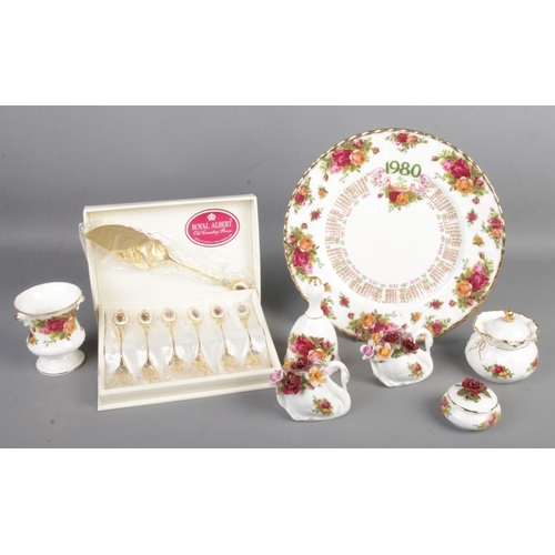 66 - A small collection of Royal Albert Old Country Roses including a boxed gold plated set of cake forks... 