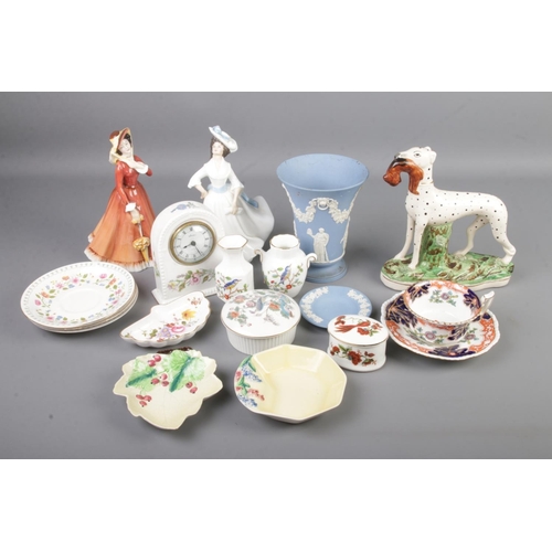 69 - A collection of names ceramics including Wedgwood, Aynsley, Royal Doulton figurines, Carlton Ware, P... 