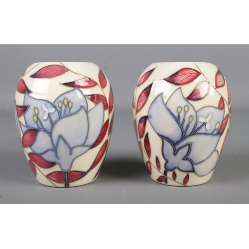 406 - A pair of Moorcroft vases in the Jacobs Ladder design. Dated 2004, height 9cm.