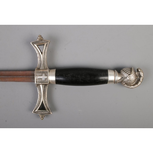 425 - A vintage Masonic Knights Templar dagger bearing crucifix to cross guard and hilt along with knights... 