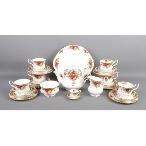 76 - A Royal Albert Old Country Roses six place tea set, containing teapot, cups and saucers, milk jug, s... 