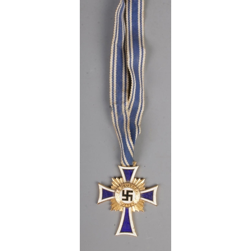 470 - German WW2 Cross Of Honour Of The German Mother Gold with ribbon. This award was instituted on 16 De... 