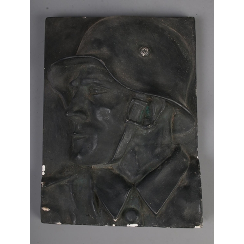 490 - A plaster cast of a WW2 German soldier.