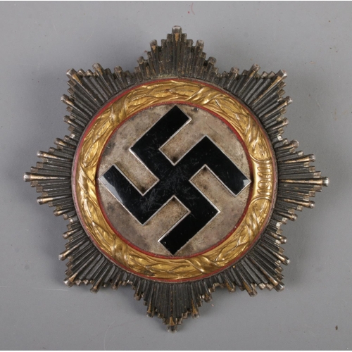 494 - A WWII Second World War Third Reich Nazi German 'Deutsches Kruez' ( The German Cross ) medal.

The W... 