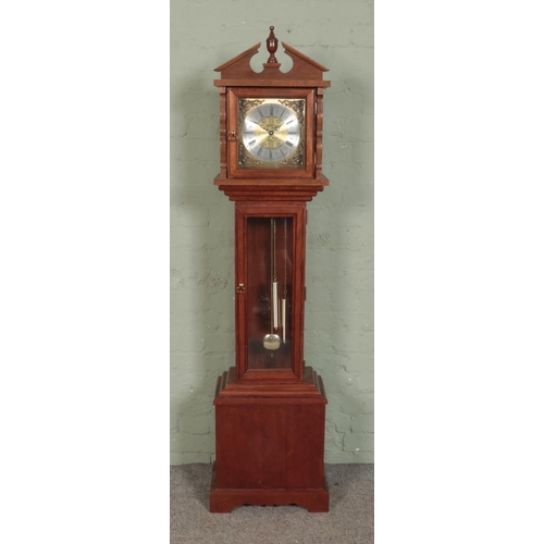 497 - A mahogany cased granddaughter clock, featuring twin weight design and Roman Numeral dial. Height: 1... 