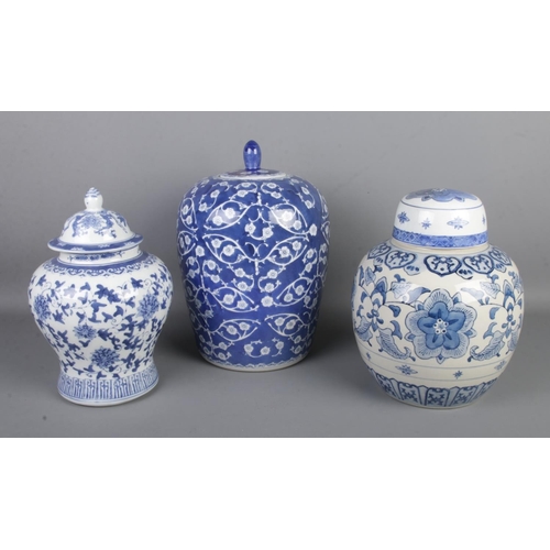 85 - Three large Chinese lidded jars to include ginger and baluster shaped examples.