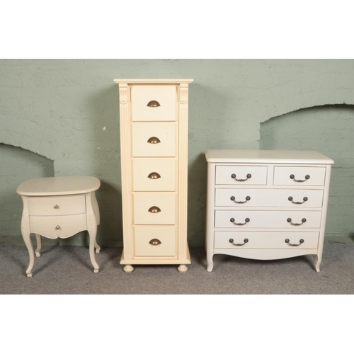 511 - Three pieces of cream painted furniture to include bedside cabinet and tall chest of five drawers.