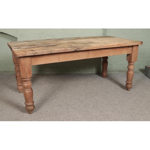 543 - A pine farmhouse style table with single drawer to each end. Approx. dimensions 193cm x 91cm x 81cm.