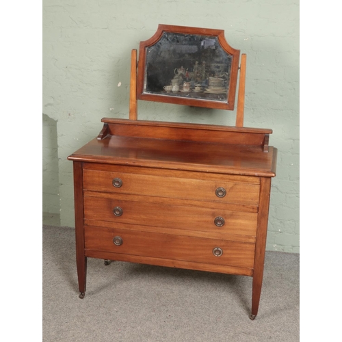 548 - A mahogany chest of draws with mirror