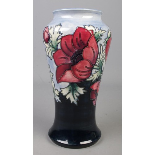 452 - A Moorcroft pottery vase decorated in the Anemone pattern by Walter Moorcroft. Date cypher for 1999.... 