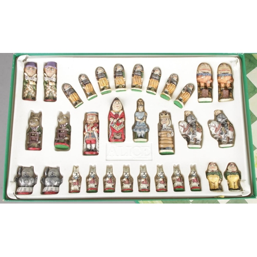 103 - A boxed and complete The Alice Chess Set by MPL Gifts & Games.