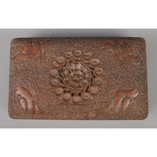 114 - An Indian hand carved cigarette box, the inside being stamped 'J A Brookes. 16 Punjab Regiment June ... 