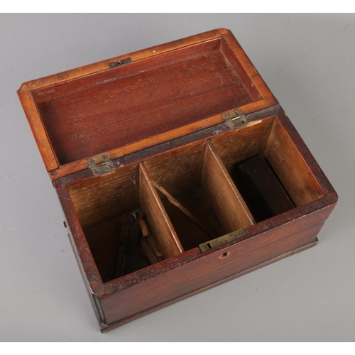 124 - A 19th century mahogany tea caddy.